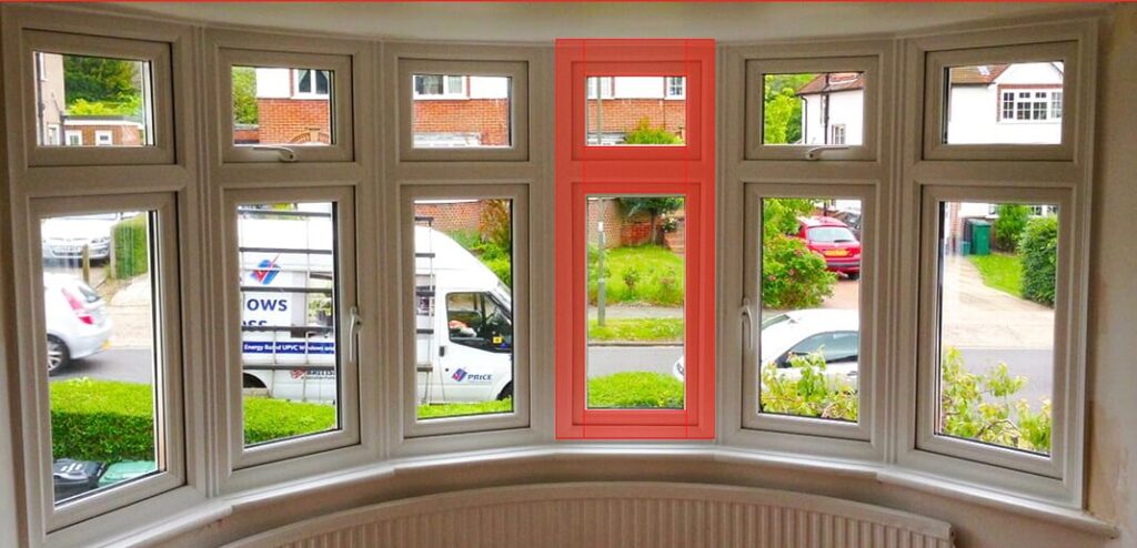 Image of bay window with 6 section uPVC windows showing the excessive space taken up by plastic frames 
