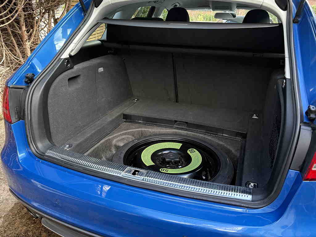 Boot floor lifted showing spare wheel